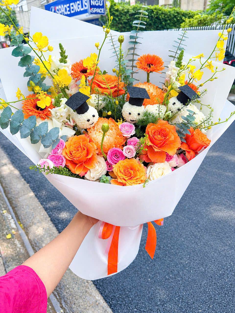 Bó hoa hồng cam phối đồng tiền tông cam, vàng, hồng và trắng
